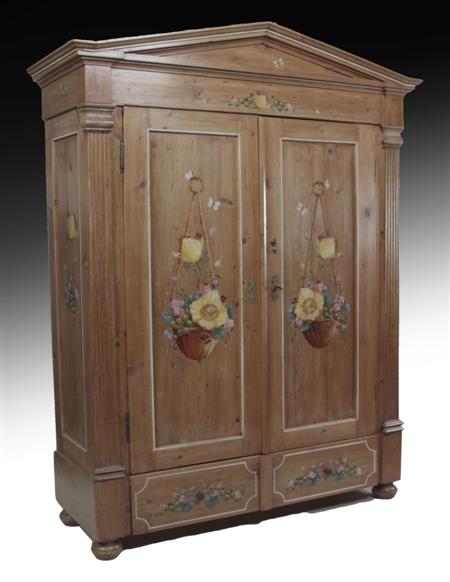 Appraisal: A th century Continental pine wardrobe the whole decorated with