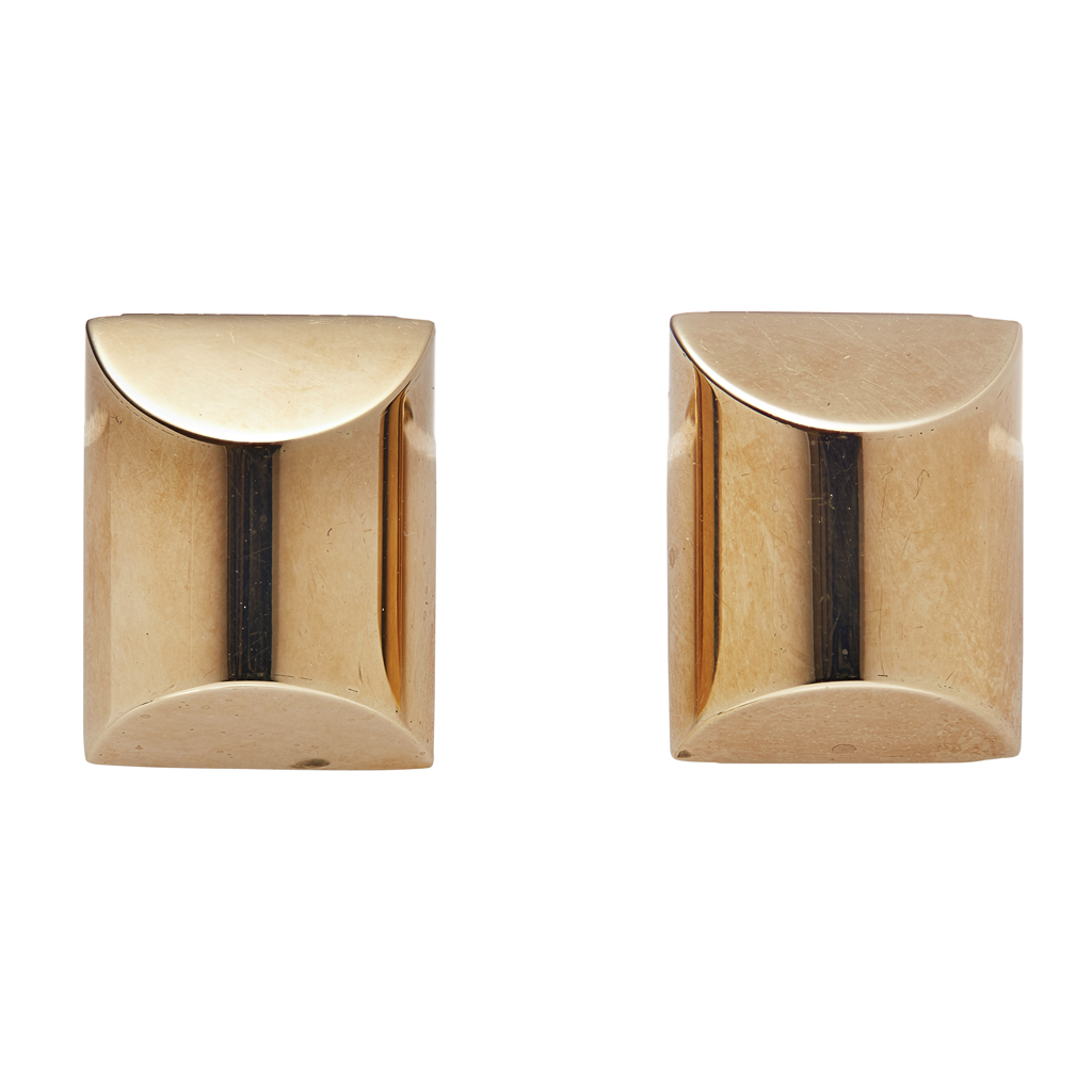 Appraisal: A pair of contemporary ear clips each of simple rounded