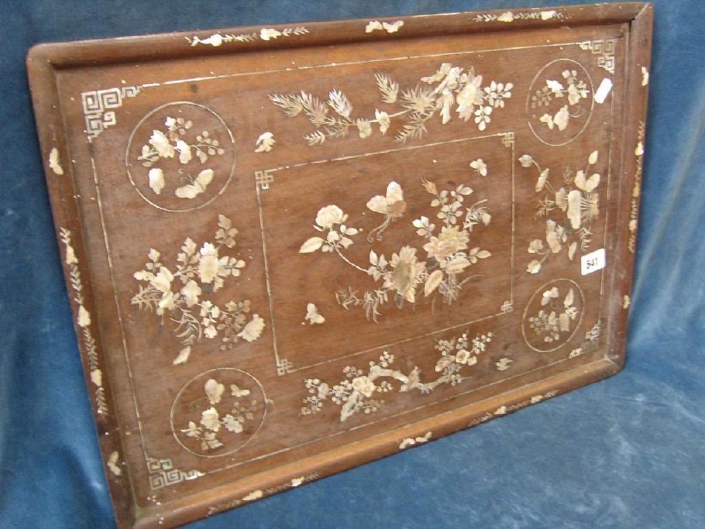 Appraisal: A Chinese hardwood service tray of rectangular form with mother