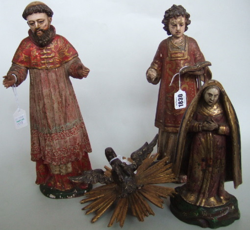 Appraisal: Three Spanish colonial carved wood and polychrome saints th century