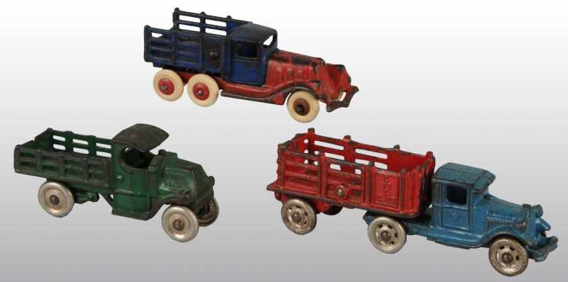 Appraisal: Lot of Cast Iron Truck Toys Description American Includes two