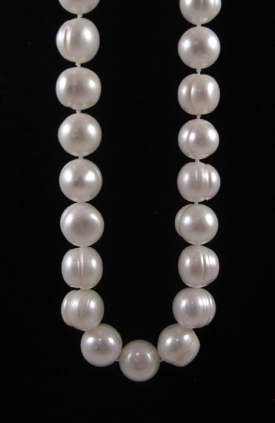 Appraisal: PRINCESS LENGTH WHITE PEARL NECKLACE measuring - inches in length