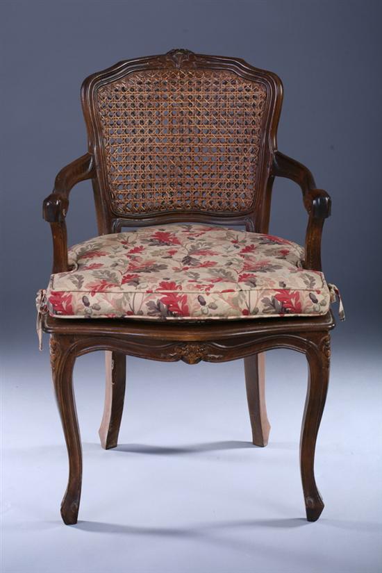 Appraisal: LOUIS XV STYLE CARVED FRUITWOOD FAUTEUIL Late th Century Double