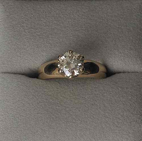 Appraisal: K gold diamond ring with a round brilliant cut fancy