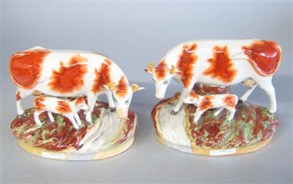 Appraisal: Pair of Staffordshire figures of cows th century Modeled as