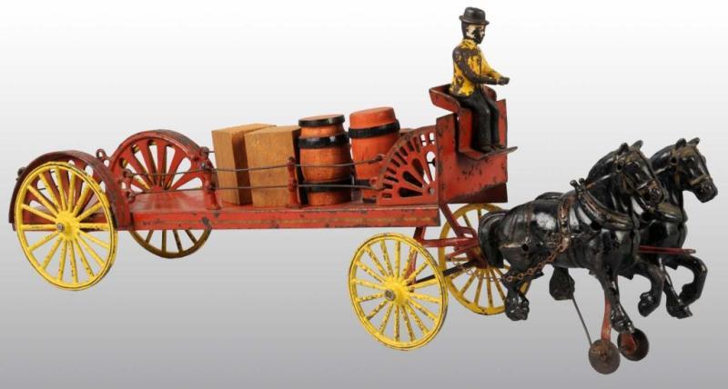 Appraisal: Cast Iron Tin Wilkins Dray Toy Description Pulled by two