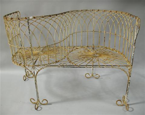 Appraisal: WROUGHT IRON CONVERSATION SEAT th century the S-form back support