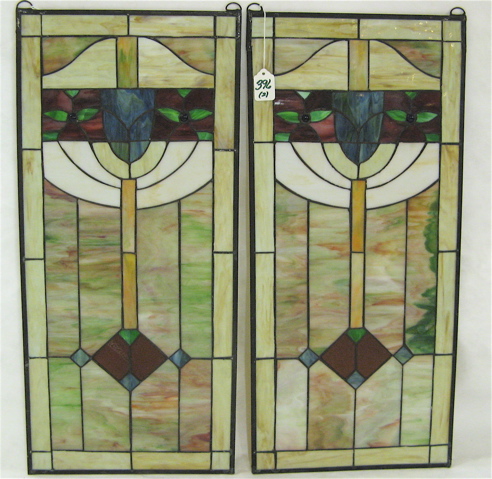 Appraisal: PAIR STAINED AND LEADED GLASS WINDOW PANELS the design forming