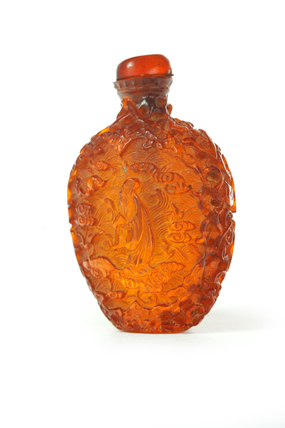 Appraisal: SNUFF BOTTLE China th century amber Highly carved snuff with