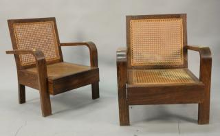 Appraisal: Pair of oak caned seat armchairs Pair of oak caned