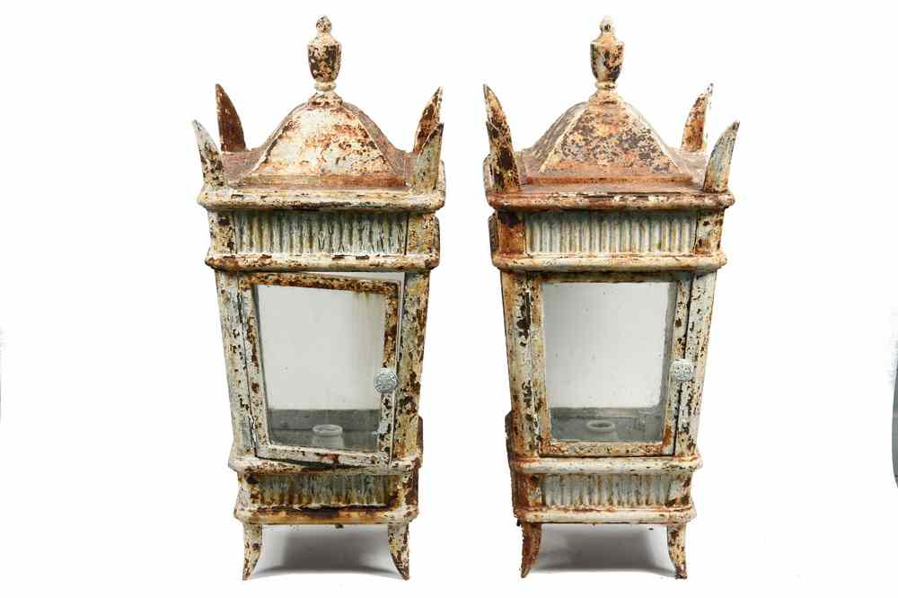 Appraisal: LAMP FIXTURES - Pair of cast iron exterior building lamp