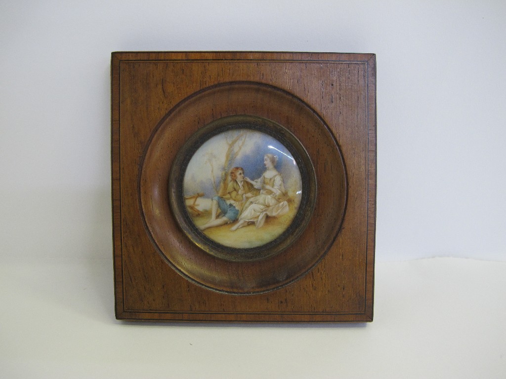 Appraisal: Framed ivory miniature painted with a courting couple