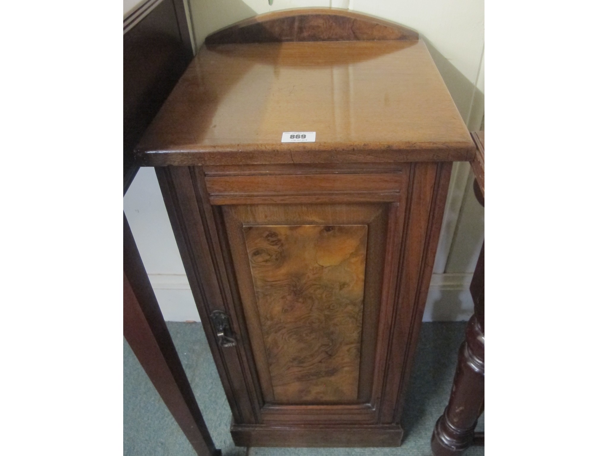 Appraisal: A Victorian walnut bedside cabinet