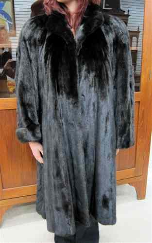 Appraisal: LADY'S NATURAL RANCH MINK COAT having dark fur two exterior