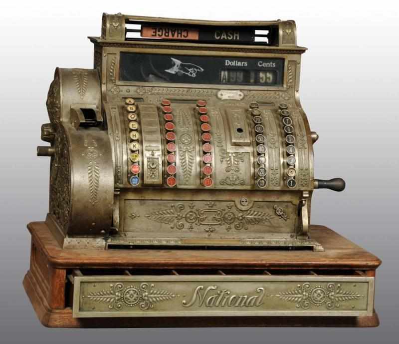 Appraisal: Nickel National Cash Register Description Working Original wheels on side