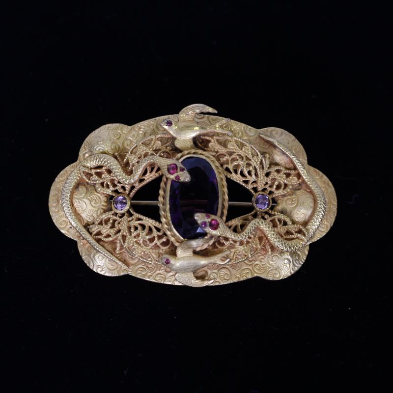 Appraisal: Victorian gilt brass sash pin mourning brooch with amethyst and