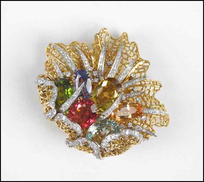 Appraisal: KERN PARIS KARAT YELLOW GOLD DIAMOND AND GEM SET CLIP