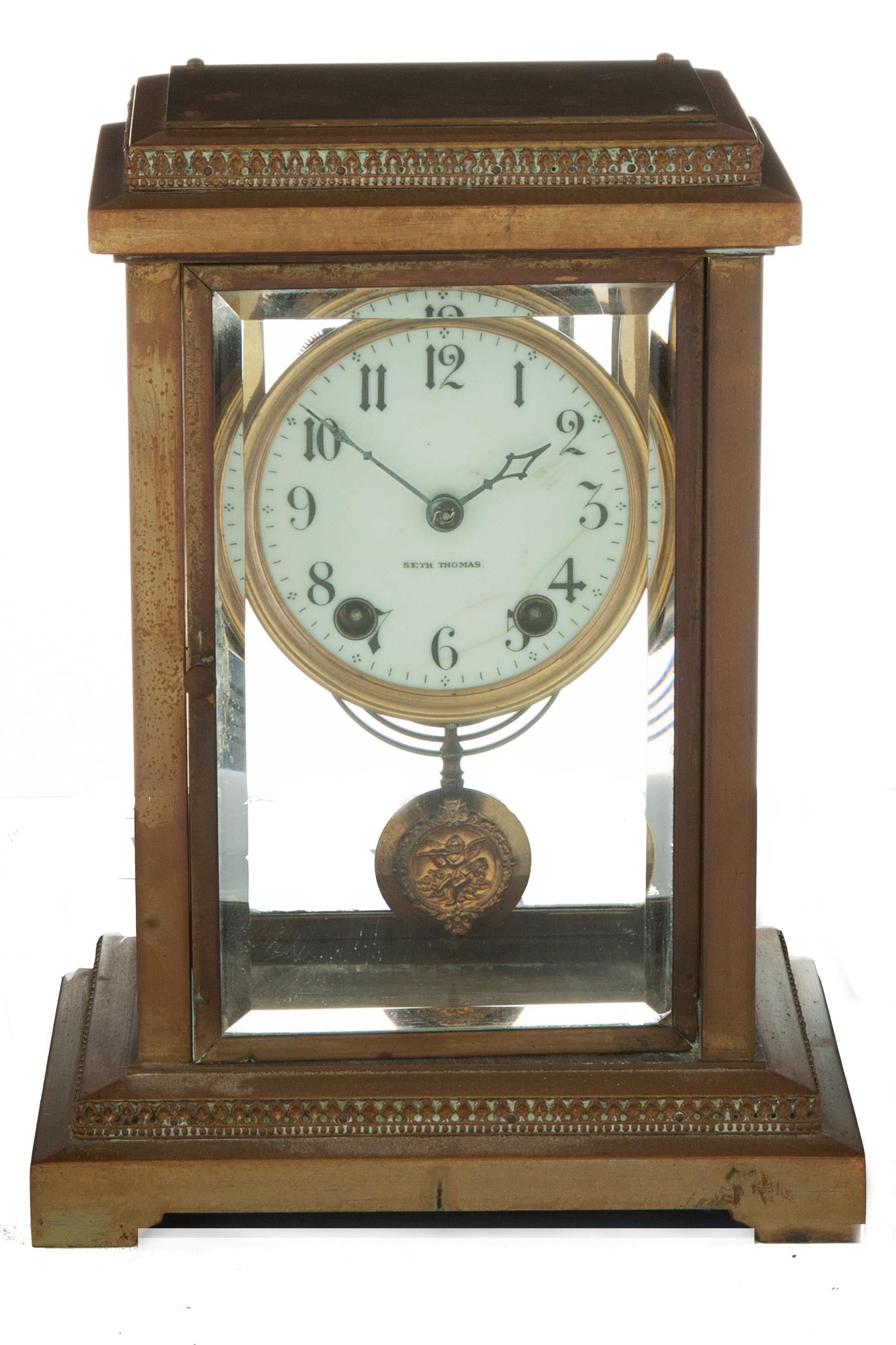 Appraisal: SETH THOMAS MANTEL CLOCK American ca Brass case beveled glass