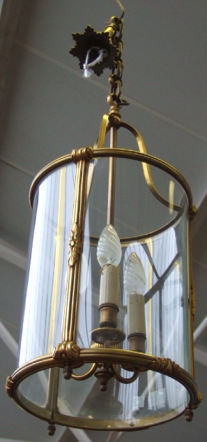 Appraisal: A pair of gilt brass cylindrical hall lanterns first half