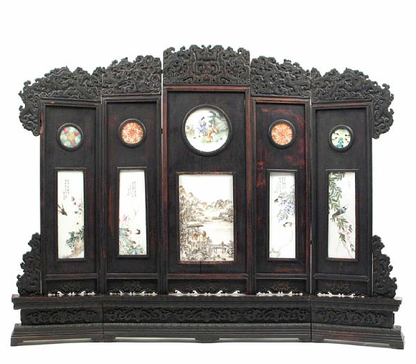 Appraisal: A Chinese five panel wood tablescreen with enameled porcelain inset