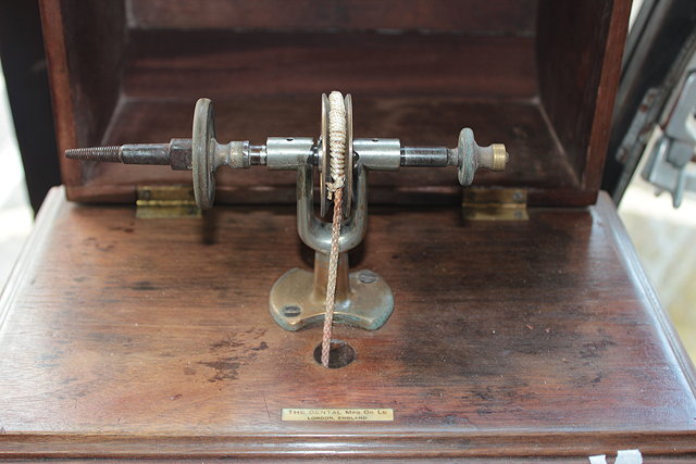 Appraisal: A DENTISTS MAHOGANY CASED TREADLE POLISHING AND GRINDING WHEEL on