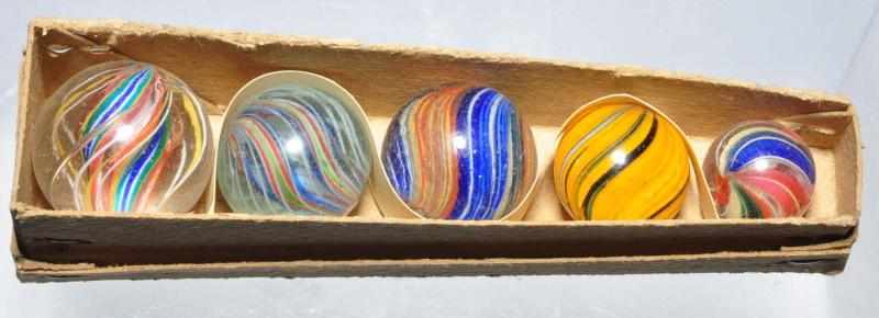 Appraisal: Marble Coffin Box with Handmade Marbles Description Coffin box with