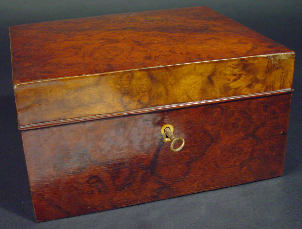 Appraisal: Rectangular burr walnut lockable cigar cabinet the lid opening to