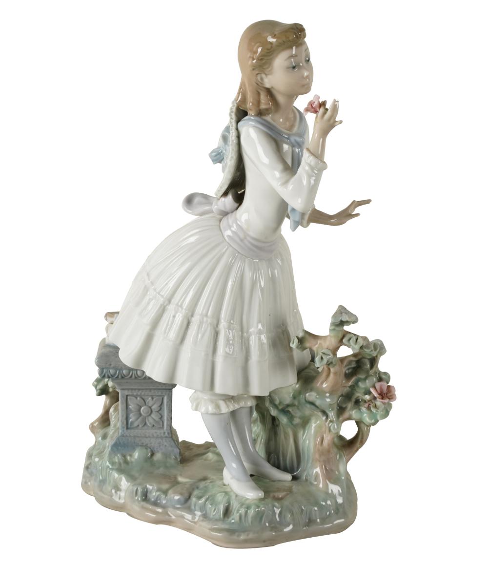 Appraisal: LLADRO PORCELAIN FIGURE OF GIRL WITH FLOWERprinted factory mark Provenance