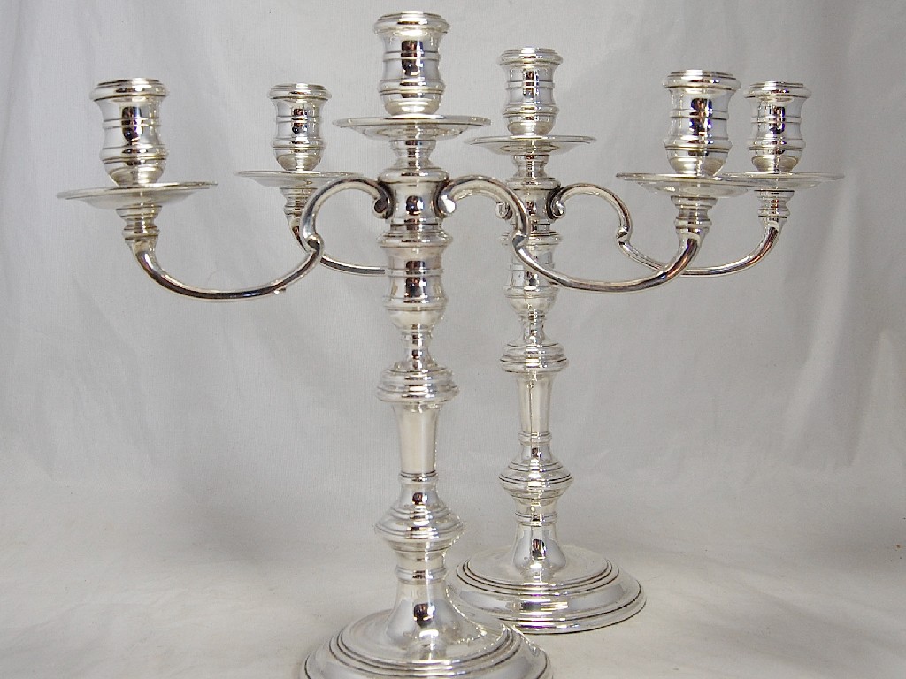 Appraisal: Pair of three light circular silver take-down candelabra having reeded