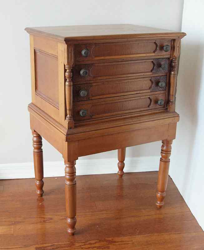 Appraisal: SPOOL CABINET ON STAND Four drawers with pressed floral design