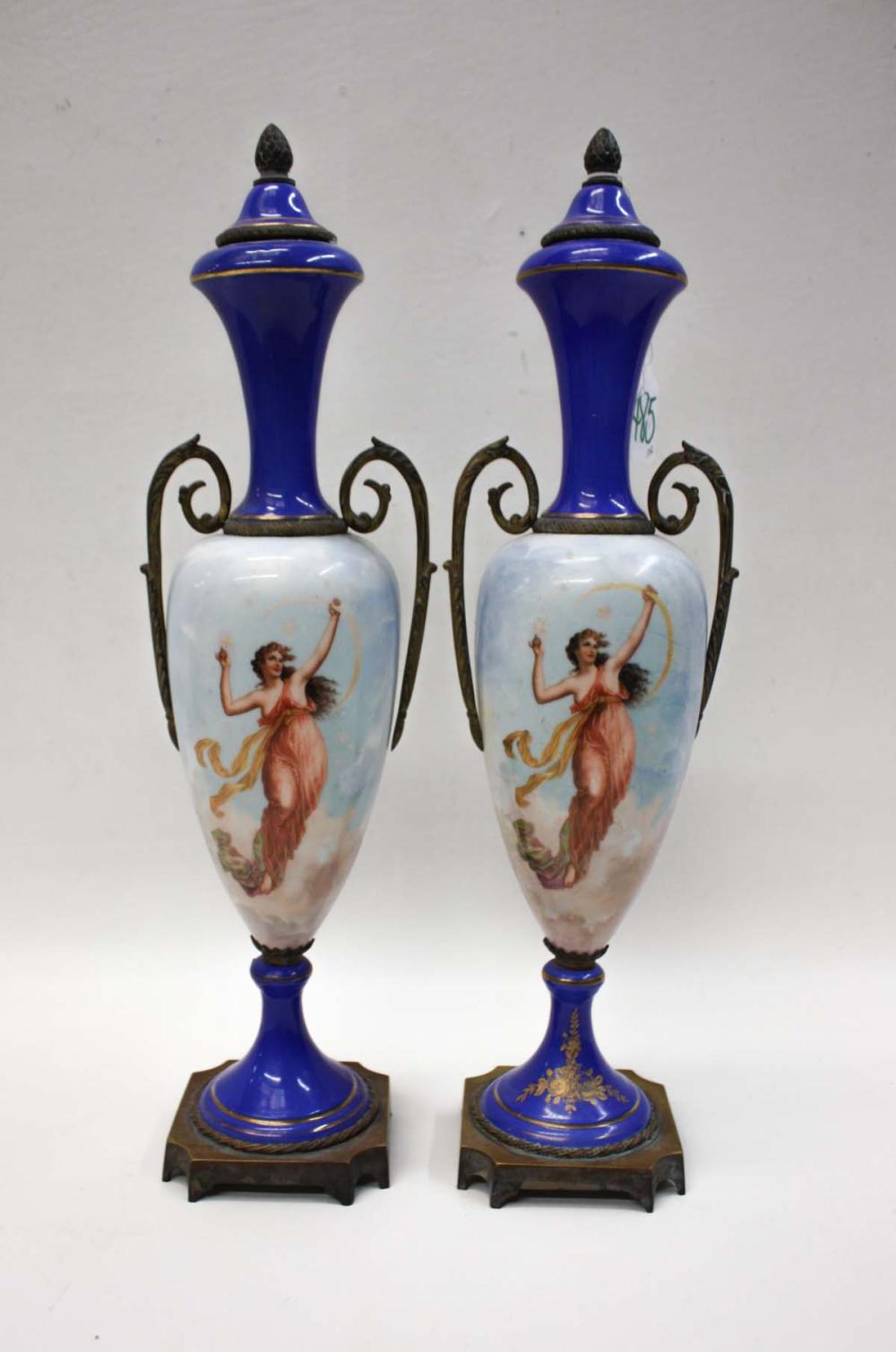 Appraisal: PAIR OF FRENCH PORCELAIN AND METAL DECORATIVE URNS each with