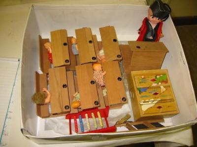 Appraisal: A dolls classroom comprising two sets each of three wooden