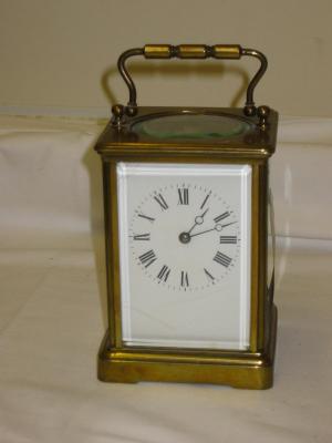 Appraisal: A FRENCH CARRIAGE CLOCK the twin barrel movement with cylinder