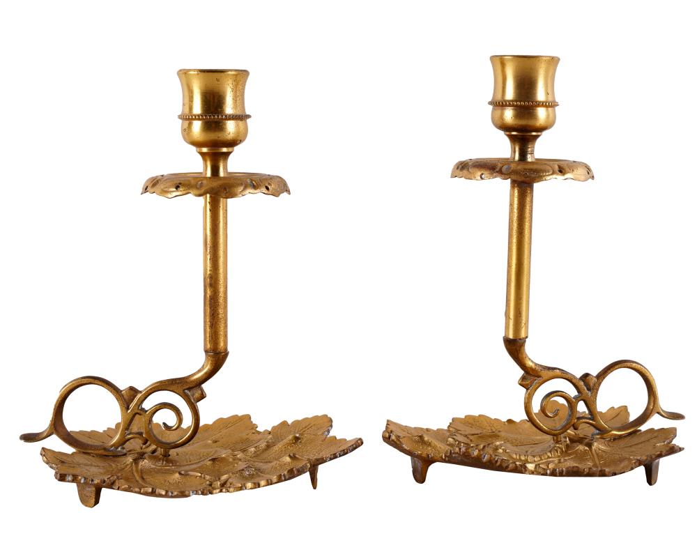 Appraisal: PAIR OF GILT BRASS CANDLESTICKSunmarked the bases modeled as maple