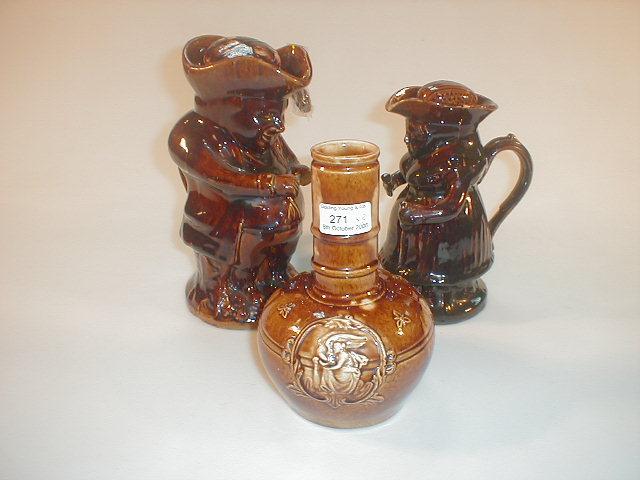 Appraisal: A thC Treacle glaze Toby jug the snuff taker high