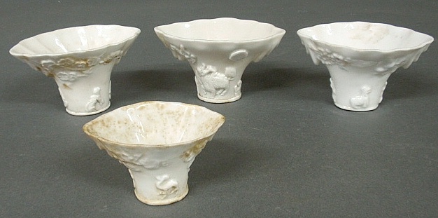 Appraisal: - Four Chinese white porcelain rhino libation cups th c