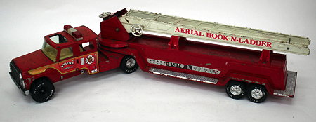 Appraisal: A RED PAINTED TIN PLATE NYLINK TOY FIRE ENGINE cm