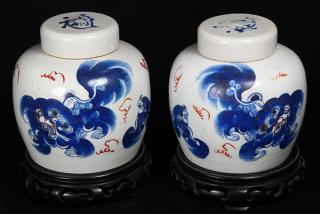 Appraisal: Two Chinese Porcelain Jars Lions lot of Chinese blue enameled