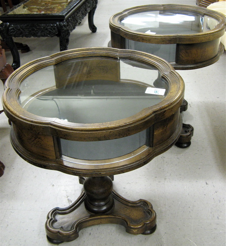 Appraisal: PAIR OF CURIO DISPLAY END TABLES American modern Each table