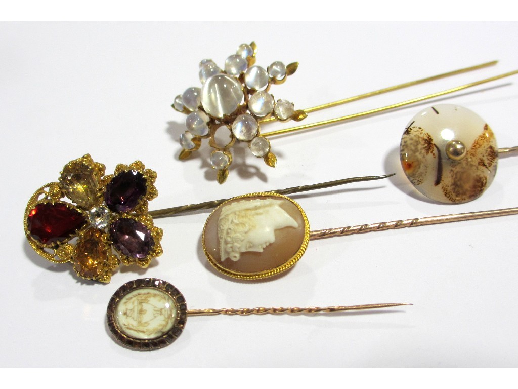 Appraisal: A collection a five gold stick pins to include a