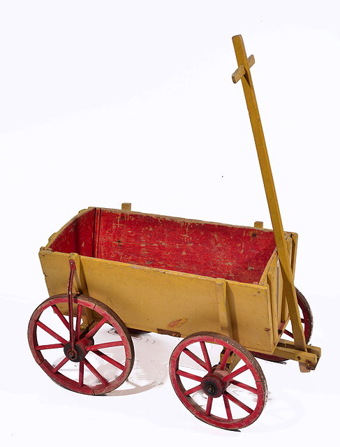 Appraisal: AN ANTIQUE PINE MUSTARD YELLOW AND RED PAINTED CHILD'S WAGON