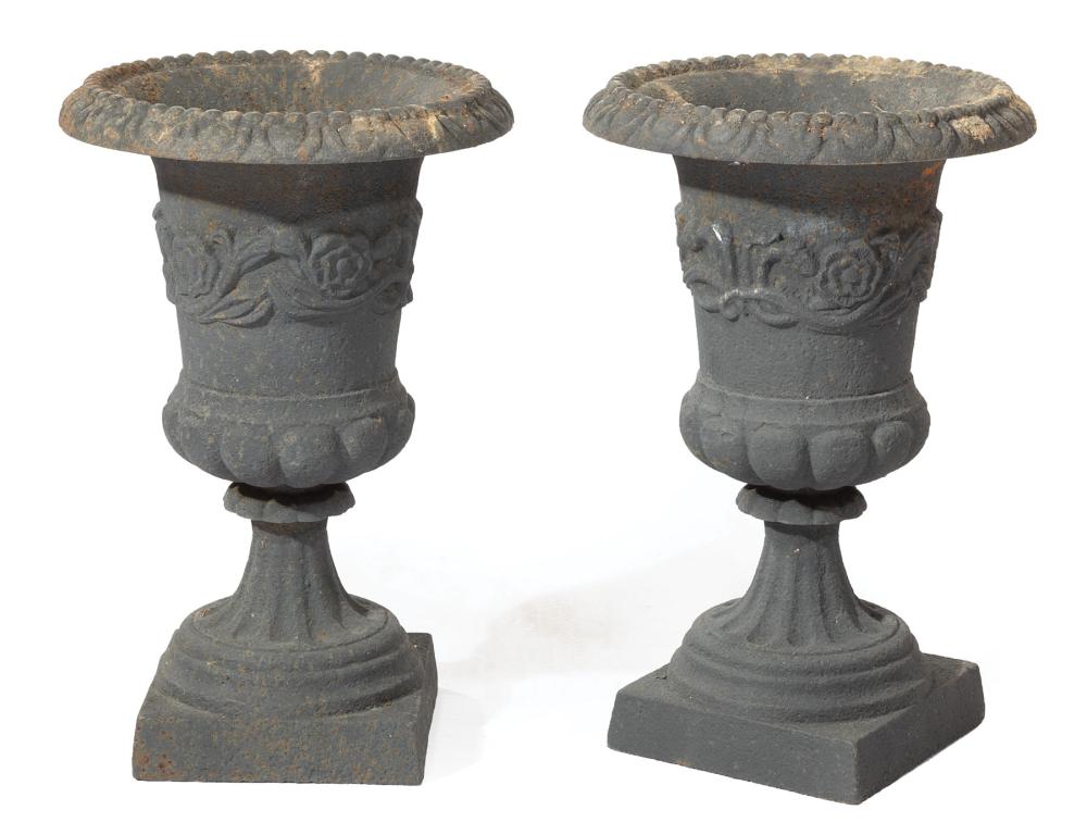 Appraisal: Pair of Cast Iron Campagna Form Garden Urns floral scroll