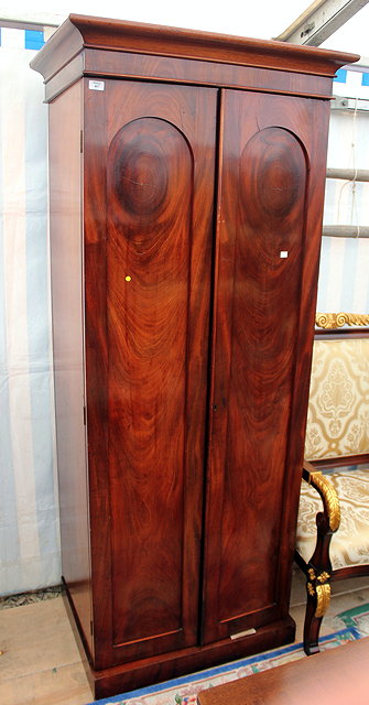 Appraisal: AN EARLY TH CENTURY MAHOGANY WARDROBE with moulded cornice above