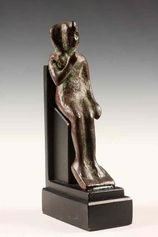 Appraisal: EGYPTIAN BRONZE - Egyptian Bronze Figure of a Seated Harpokrates