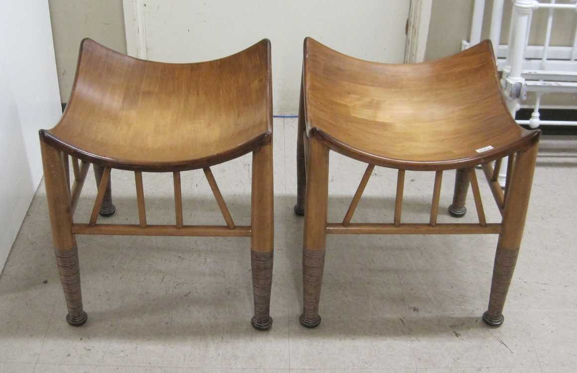 Appraisal: PAIR OF MODERN AFRICAN WOOD STOOLS each having a square