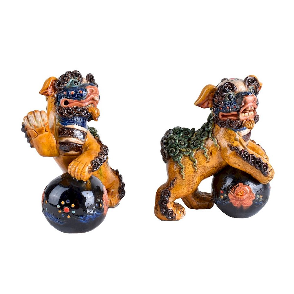 Appraisal: Pair of Wucai Style Pottery Foo Dog Figures Pair of