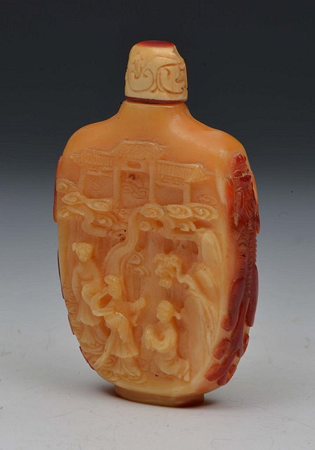 Appraisal: A CHINESE HORNBILL SNUFF BOTTLE carved figures in and around