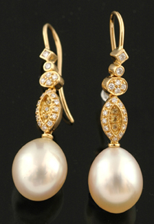 Appraisal: A pair of South Sea pearl sapphire and diamond earrings