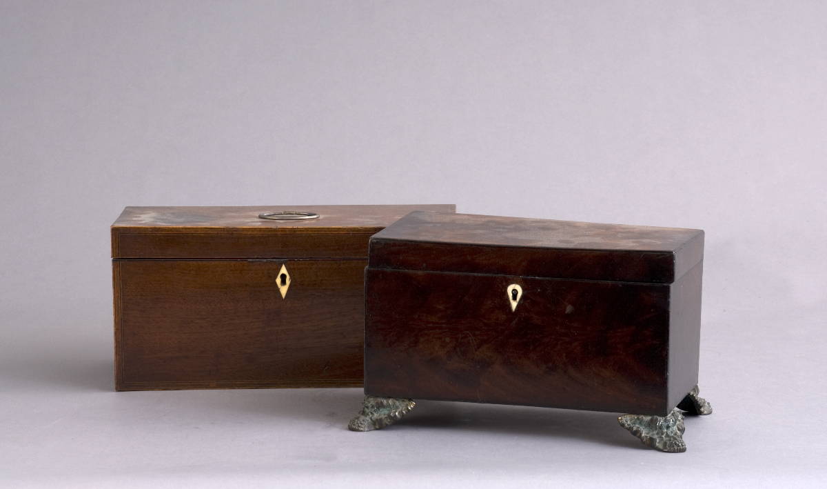 Appraisal: TWO GEORGIAN MAHOGANY TEA CADDYS WITH IVORY ESCUTCHEONS Length of