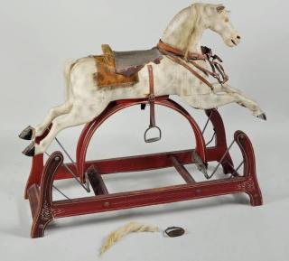 Appraisal: American Carved And Painted Rocking Horse American carved and painted